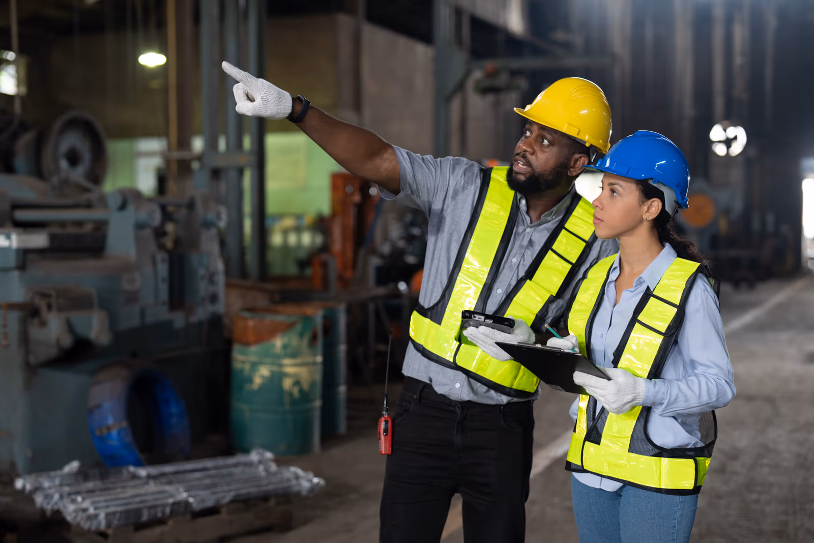 Two employees undertaking a risk assessment