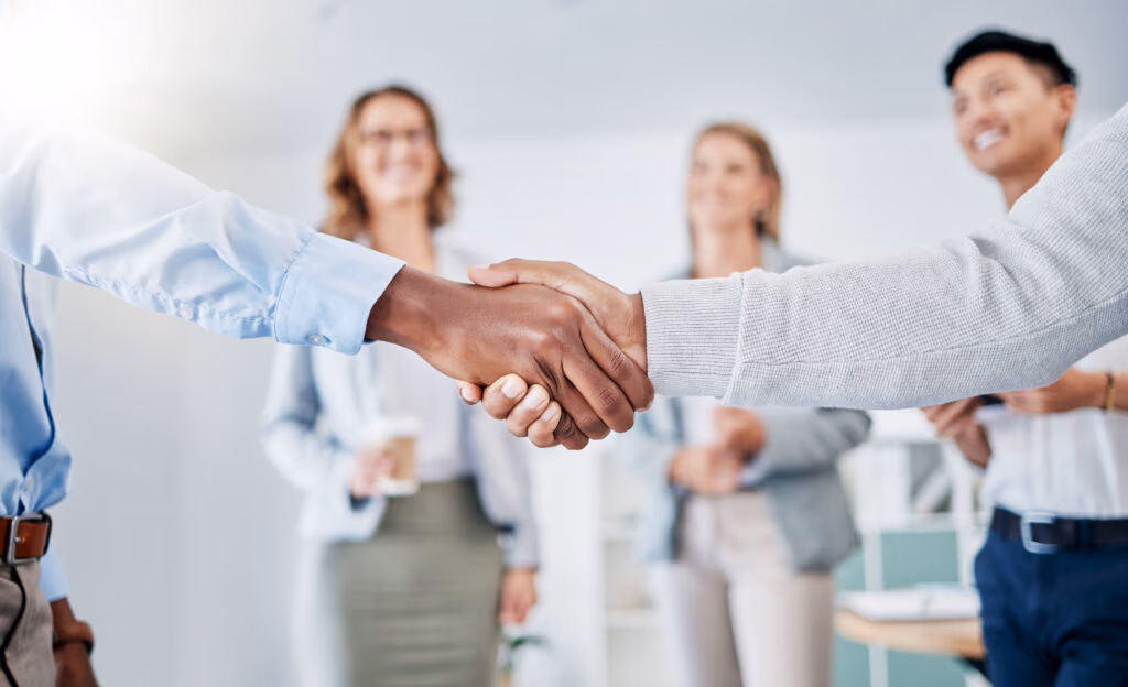 Business people shaking hands for partnership and collaboration
