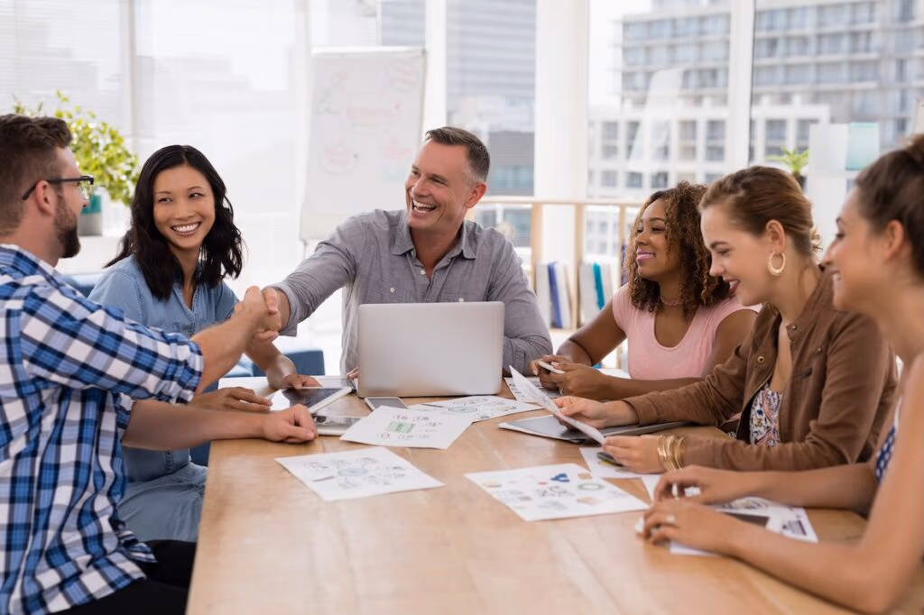 smiling team in meeting