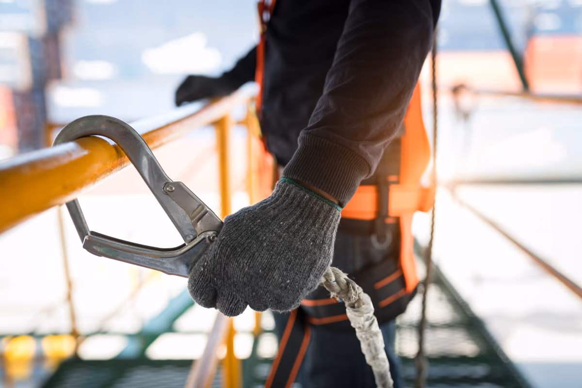 Lone worker clipped to scaffolding